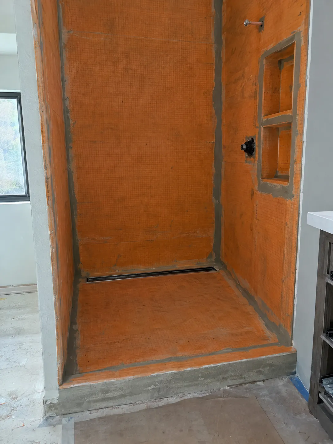 Shower pan and waterproofing membrane before tile