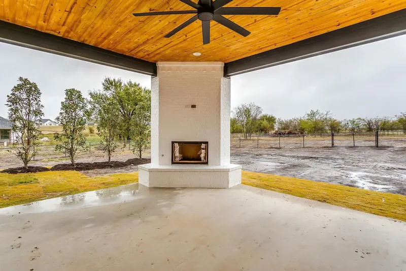 Covered patio with fireplace